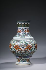 A DOUCAI 'PHOENIX AND INTERLOCKING PATTERN' VASE