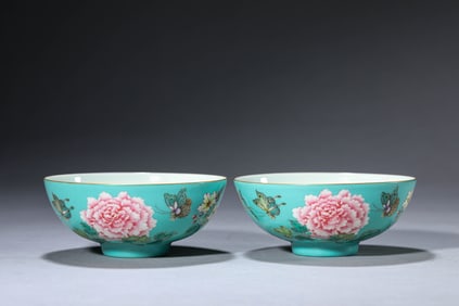 A PAIR OF TURQUOISE-GROUND FAMILLE-ROSE 'BUTTERFLY-AND-FLOWER' BOWLS