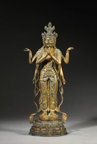 A GILT-BRONZE SIX-ARMED AVALOKITESHVARA