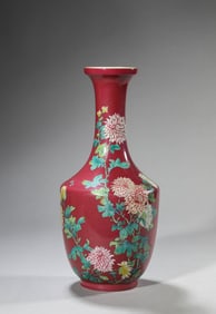 A PEACHBLOOM-GROUND FAMILLE-ROSE 'FLORAL PROSPERITY' VASE