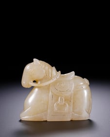 A 'RECUMBENT HORSE' CARVING