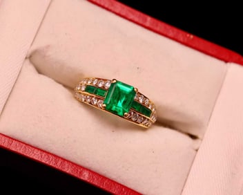 BOUCHERON EMERALD AND DIAMOND RING