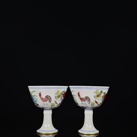 A PAIR OF DOUCAI AND GILT STEM CUPS