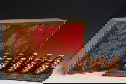 AN IRON-RED WITH GILT-DECORATED 'DRAGONS' VASE