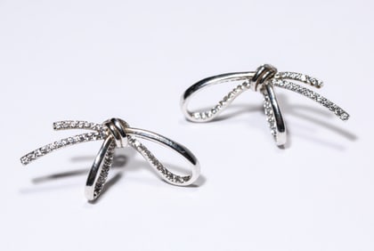 A PAIR OF SILVER EARRINGS