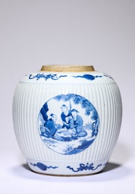 A BLUE AND WHITE 'FIGURES' JAR
