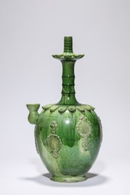 A GREEN-GLAZED VASE