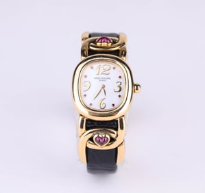 A PATEK PHILIPPE 18K GOLD QUARTZ WATCH
