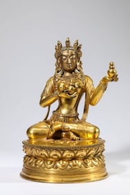 A GILT-BRONZE FIGURE OF BUDDHA