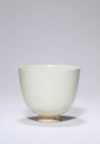 A WHITE PORCELAIN CUP