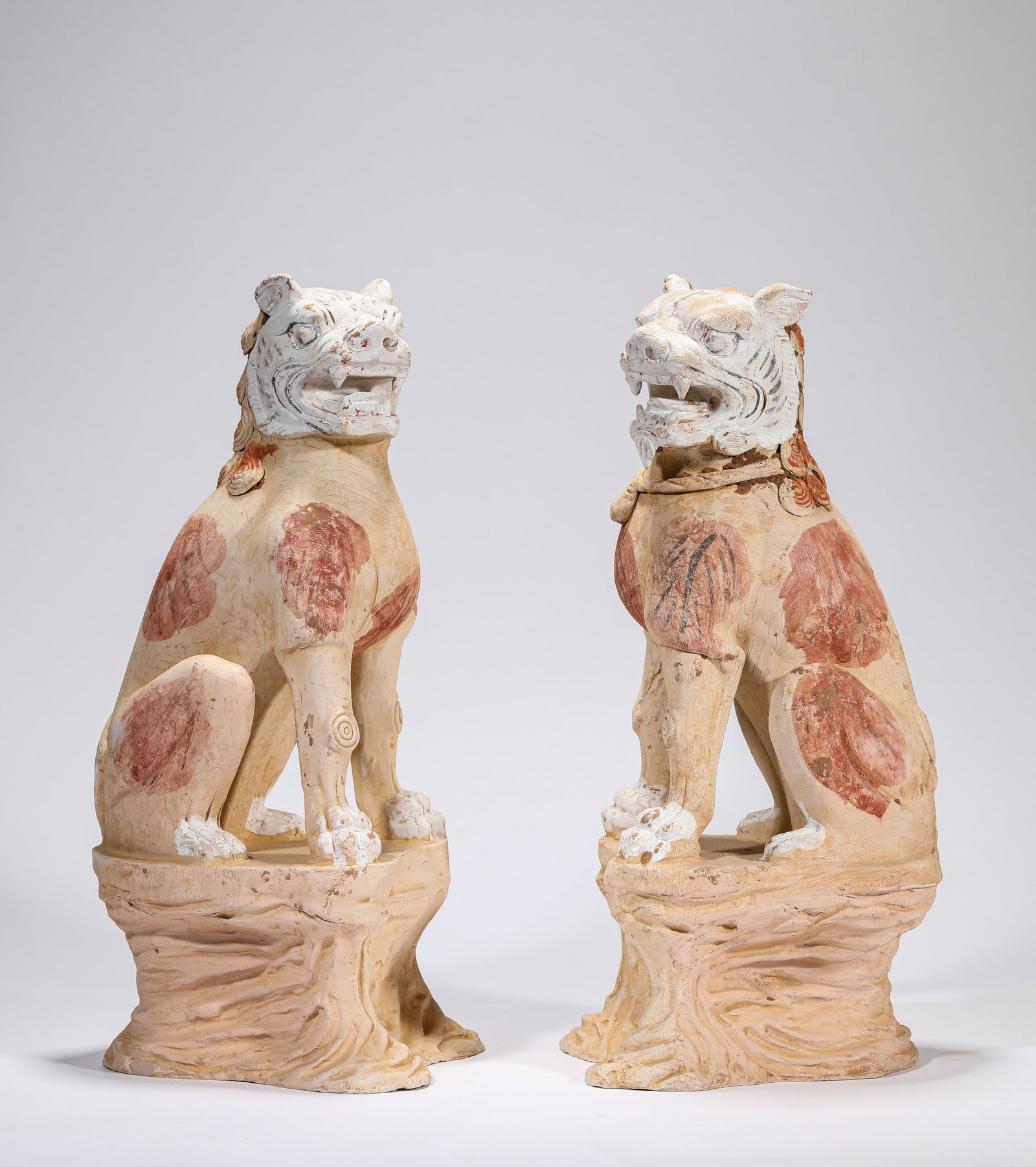 A PAIR OF POTTERY LIONS (1 of 13)