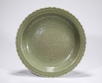 A LONGQUAN CELADON 'CARVED FLORAL' DISH