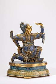 A CLOISONNé ENAMEL FIGURE OF FOREIGNER