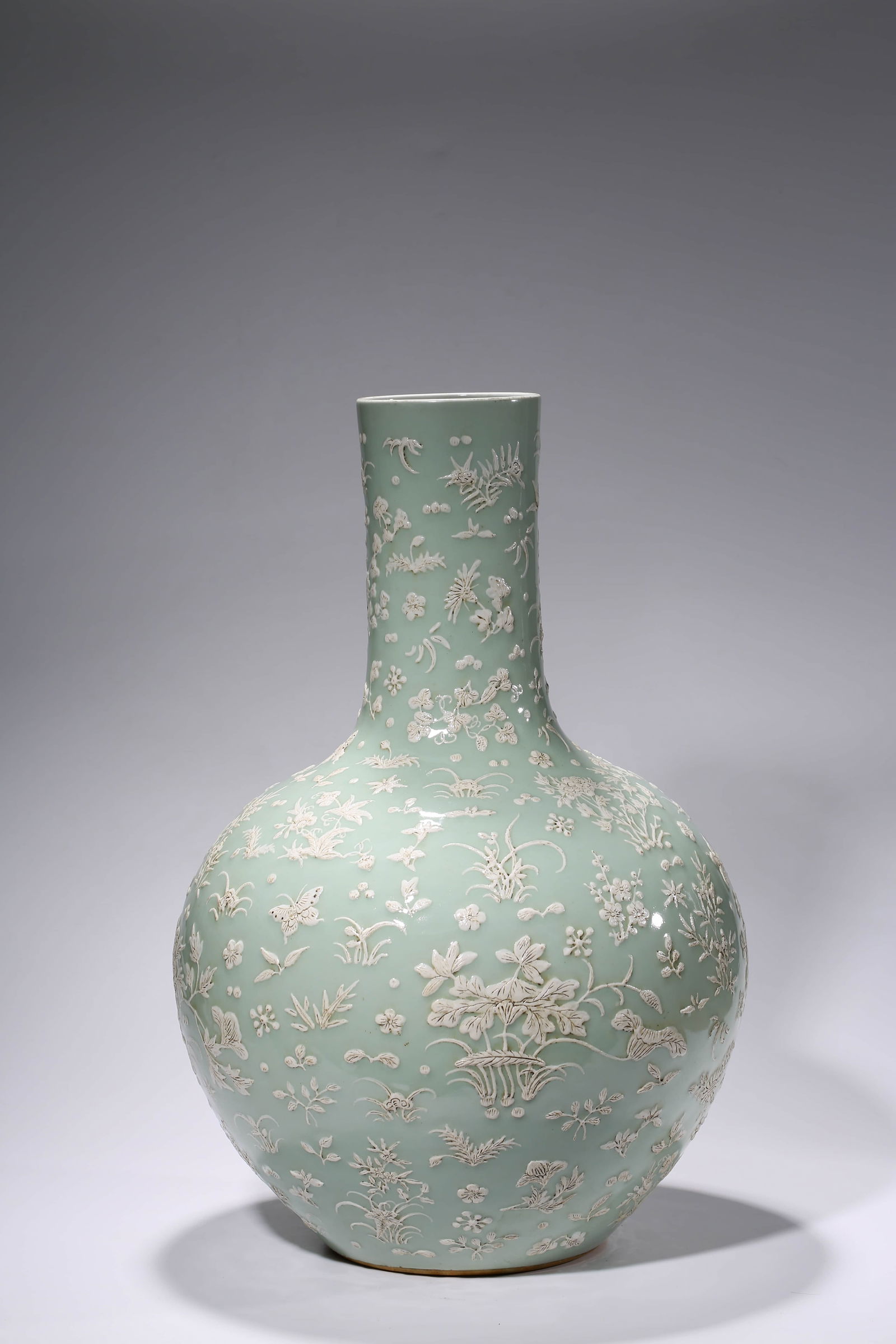 A POWDER-BLUE GROUND 'BUTTERFLY-AND-FLOWER' GLOBULAR VASE (1 of 9)