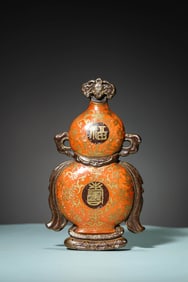 A CORAL-RED GROUND GILDED 'LONGEVITY' WALL VASE