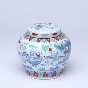 A WUCAI 'INFANTS PLAYING' COVERED JAR