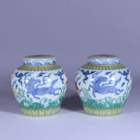 A PAIR OF WUCAI 'SEA HORSE' JARS