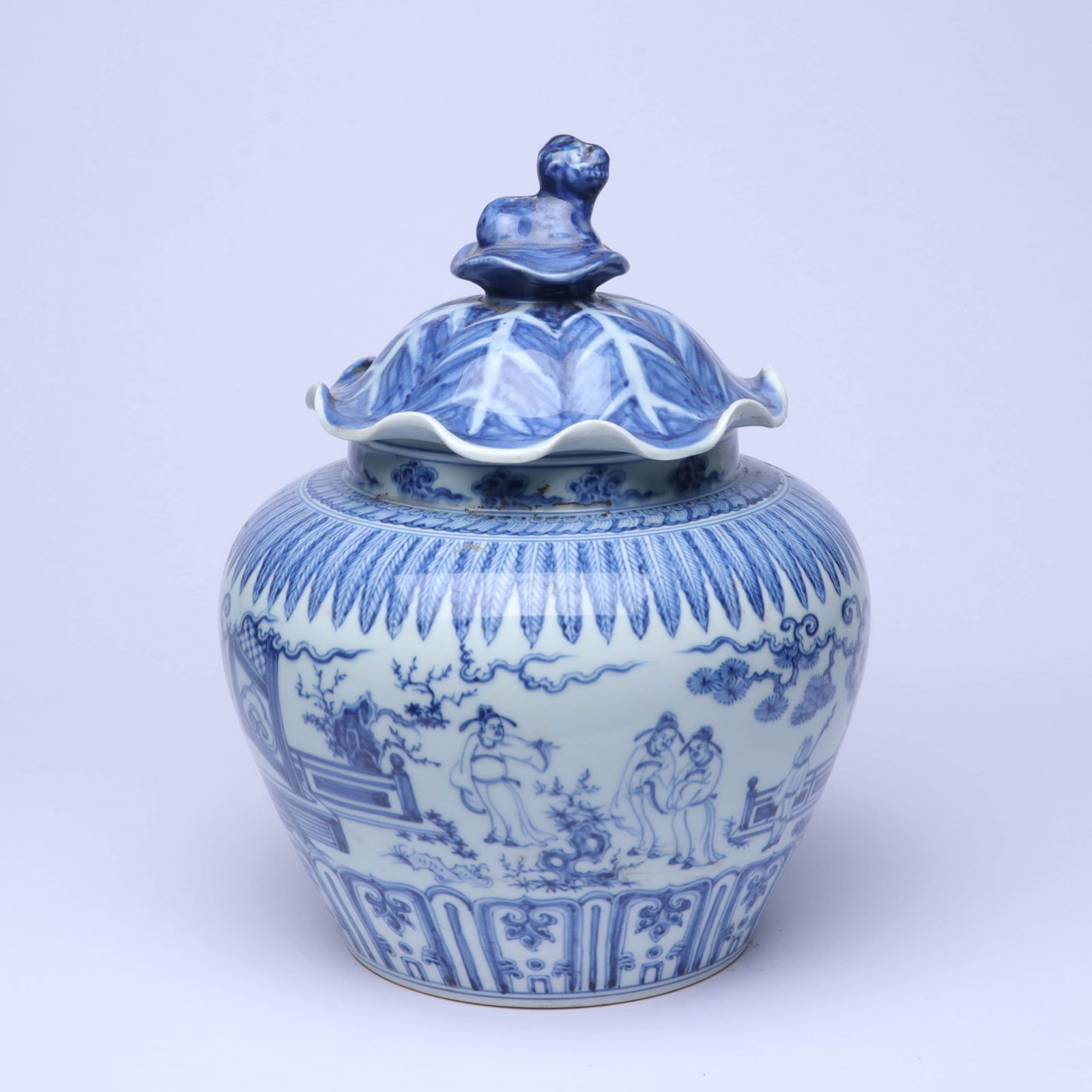 A BLUE AND WHITE 'FIGURES AND STORY' LOTUS-LEAF COVERED JAR (1 of 9)