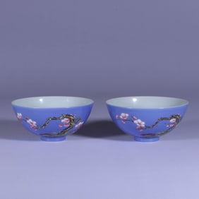 A PAIR OF BLUE-GROUND FAMILLE ROSE 'FLORAL ' BOWLS