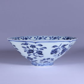 A BLUE AND WHITE 'FLOWER' CONICAL BOWL