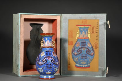 A BLUE-GROUND YANGCAI 'INTERLOCKING FLOWERS' VASE