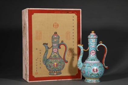 A GREEN-GROUND FAMILLE ROSE 'FLORAL ' EWER