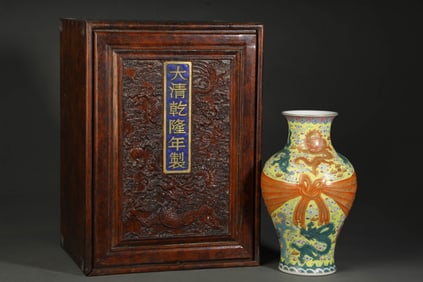 A YELLOW-GROUND FAMILLE ROSE 'DRAGON' WRAPPED VASE