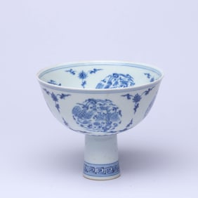 A BLUE AND WHITE 'PHOENIX' STEM BOWL