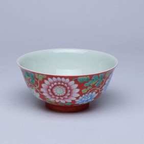 AN ENAMEL 'INTERLOCKING FLOWERS' BOWL