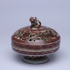 A UNDERGLAZED RED 'PHOENIX AMONG FLOWERS' BEAST-FORM CENSER