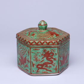 A RED AND GREEN 'DRAGON AND PHOENIX' HEXAGONAL COVERED JAR