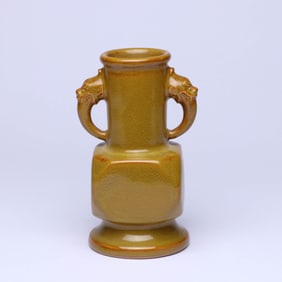 A TEA-DUST GLAZED BEAST-HANDLE VASE
