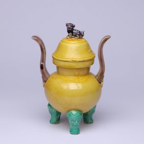 A YELLOW-GLAZED BEAST-FORM TRIPOD CENSER