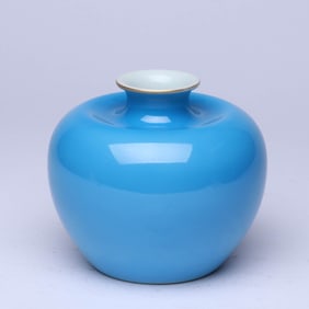 A BLUE-GLAZED APPLE SHAPED JAR