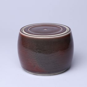 A SACRIFICIAL RED-GLAZED 'CLOUD AND PHOENIX' COVERED JAR