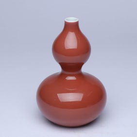 A SACRIFICIAL RED-GLAZED GOURD-SHAPED VASE