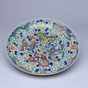 A WUCAI 'DRAGON AND PHOENIX AMONG FLOWERS' DISH
