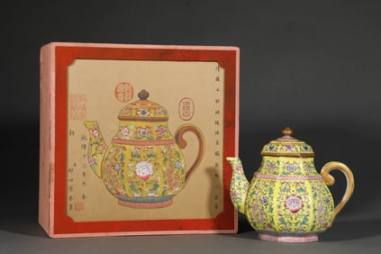 AN ENAMEL 'DRAGON AMONG FLOWERS' OCTAGONAL EWER