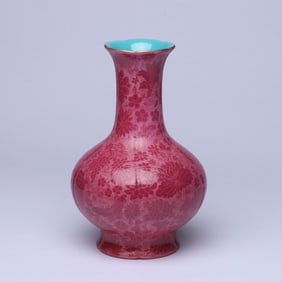 A RUBY RED-GLAZED 'FLOWERS AND BUTTERFLIES' LOBED VASE