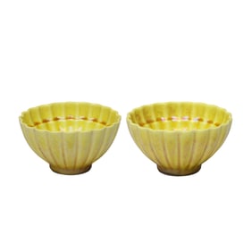 A PAIR OF YELLOW-GLAZED CHRYSANTHEMUM-PETAL CUPS