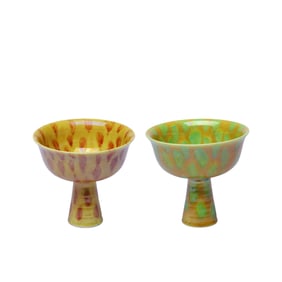 A PAIR OF YELLOW-GLAZED STEM CUPS