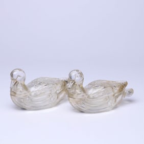 A PAIR OF CRYSTAL DUCK-FORM COVERED BOXES
