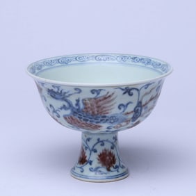 A BLUE AND WHITE AND UNDERGLAZED RED 'PHOENIX AMONG FLOWERS' STEM BOWL