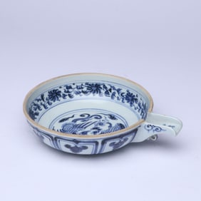 A BLUE AND WHITE 'PHOENIXES' EWER