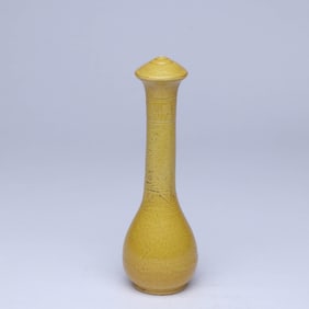 A YELLOW-GLAZED 'CLOUD AND DRAGON' BRUSH HOLDER