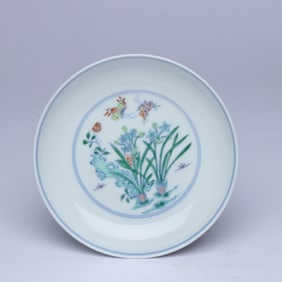 A DOUCAI 'ROCKERY, FLOWERS AND BUTTERFLIES' DISH