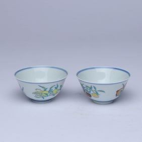 A PAIR OF DOUCAI 'THREE FRUITS' CUPS