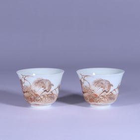 A PAIR OF GRISAILLE 'REEDS, CRANE AND POETRY' CUPS