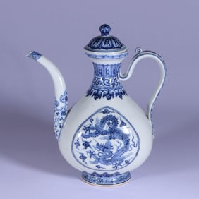 A BLUE AND WHITE 'CLOUD AND DRAGON' COVERED EWER