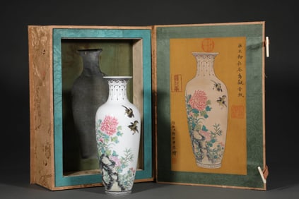 A FAMILLE ROSE 'FLOWERS AND BIRDS' GUANYIN VASE